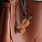 Sleutelhanger met viool in modieus ontwerp