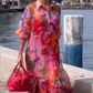 Rode jurk van chiffon met bloemenprint