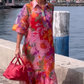 Rode jurk van chiffon met bloemenprint