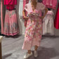 Elegante lange jurk met bloemenprint en V-hals voor dames