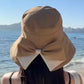 👒 TIJDELIJKE AANBIEDING: 50% KORTING! ✨ Dames zonnehoed met strik en brede rand – opvouwbaar, 360° zonbescherming 🎀