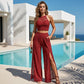 Elegante kanten top en wijde broek met split.